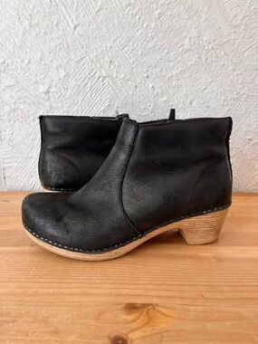 Dansko Black Leather Ankle Clog Booties with Wood-Look Heel